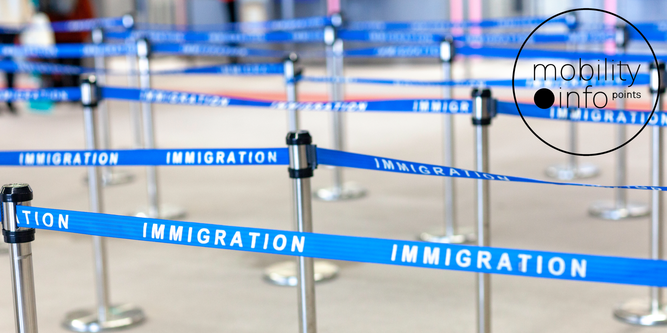 Photograph of the line divider / crowd control stanchions typical of an immigration line at an airport. The lines are blue and labeled "immigration." In the upper right hand corner the logo for Mobility Infopoints is on top of the image, in black lines with a transparent background showing the photo underneath.